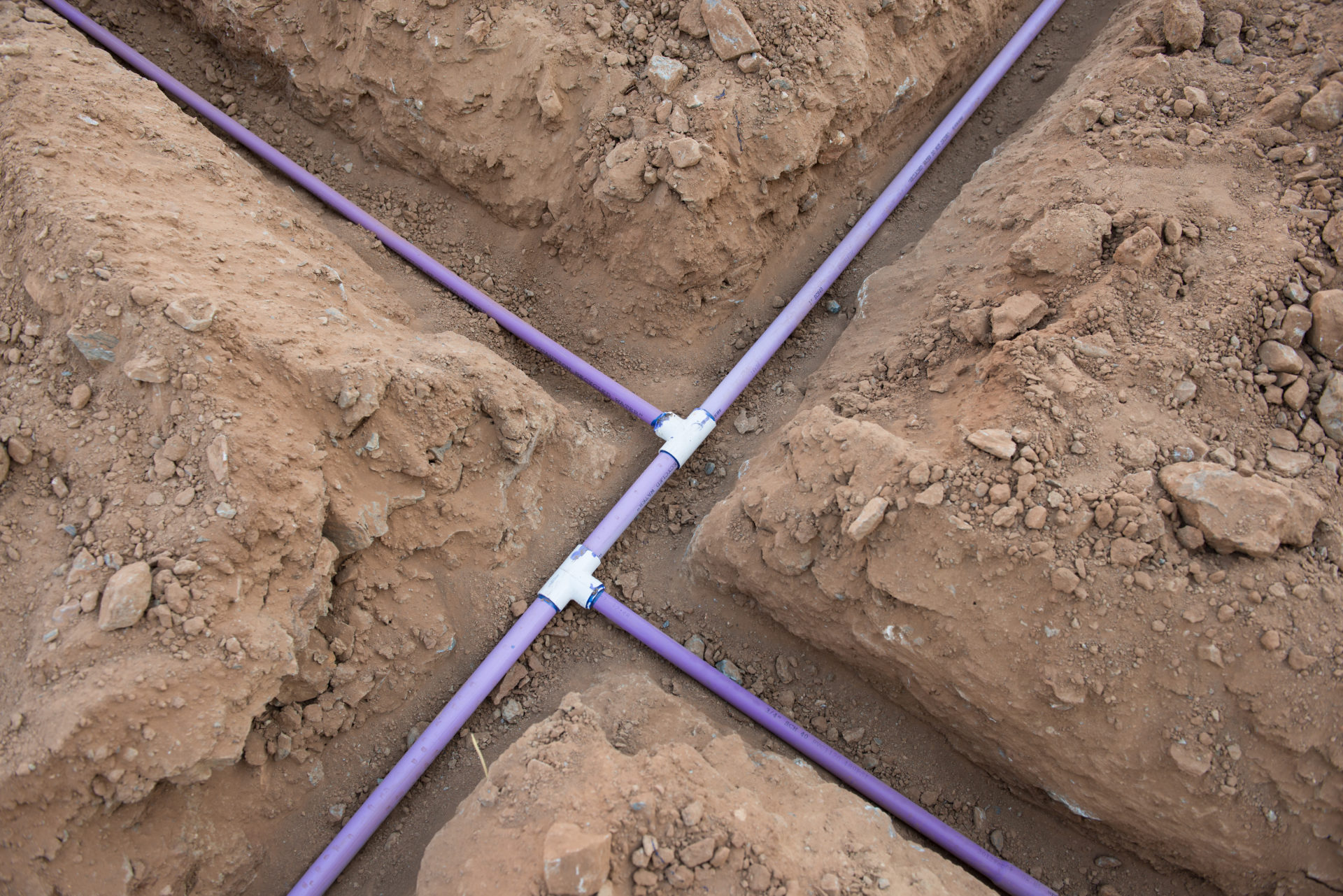 Sprinkler System Pipe Installation in trench